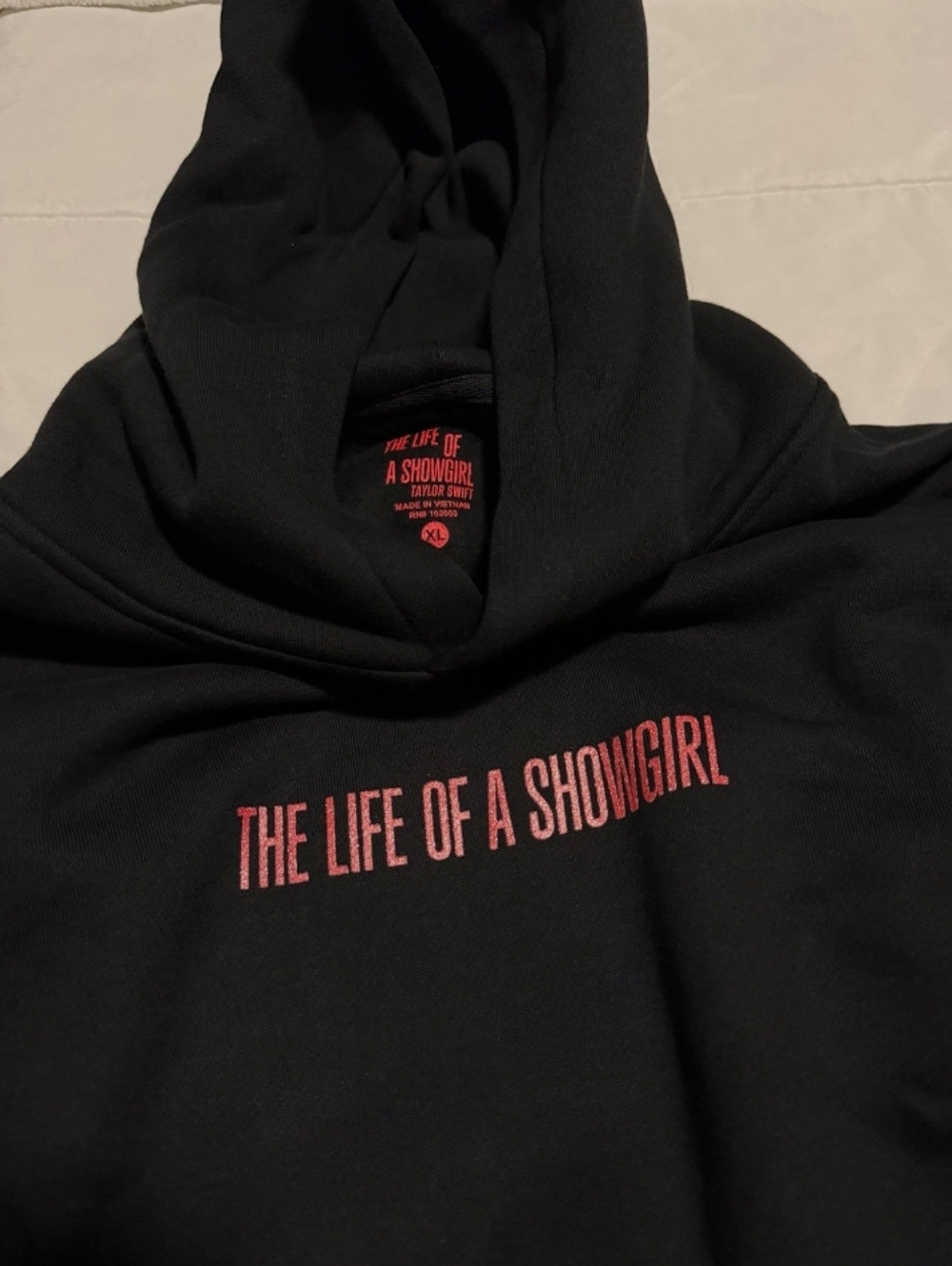 The Life of a Showgirl Black Hoodie with Pink Logo